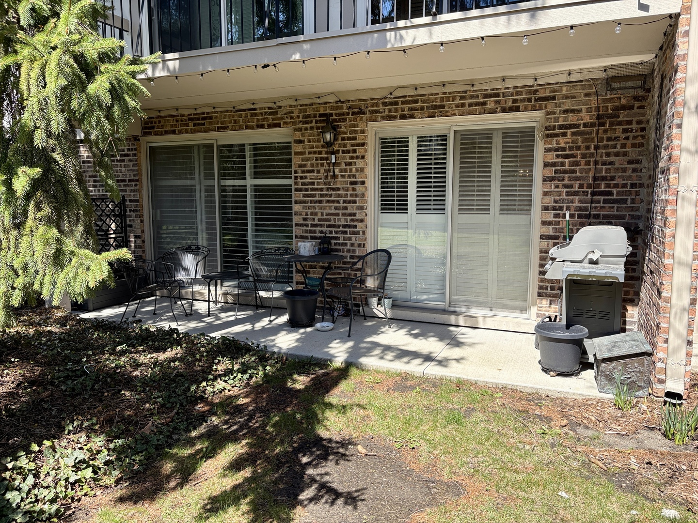5802 Wolf Road, Unit 1 Western Springs, IL 60558 - Photo 15 of 16 a view of a house with yard and sitting area