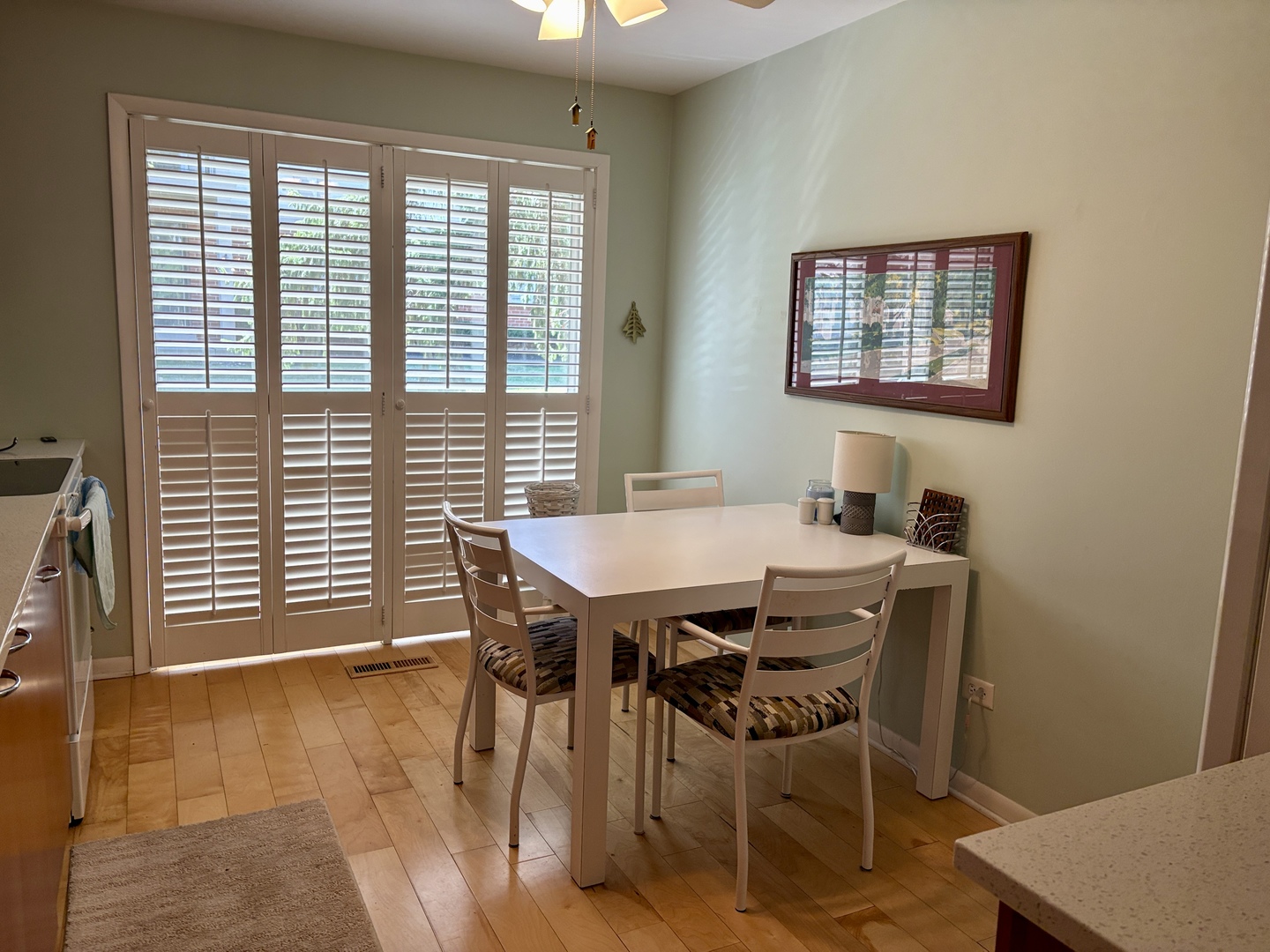 5802 Wolf Road, Unit 1 Western Springs, IL 60558 - Photo 7 of 16 a view of a dining room with furniture and window
