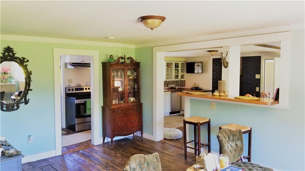 74 Ahonen Road Otisfield, ME 04270 - Photo 8 of 33 View from living room into kitchen.