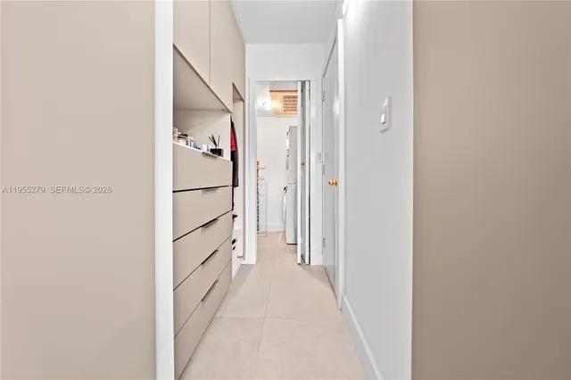 a view of a hallway with closet
