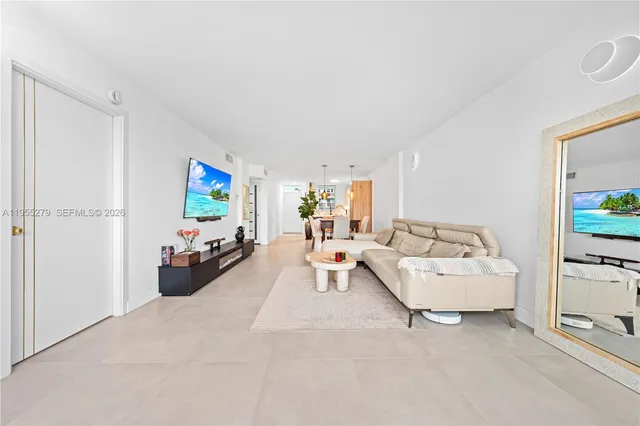 a bed room with furniture and a window