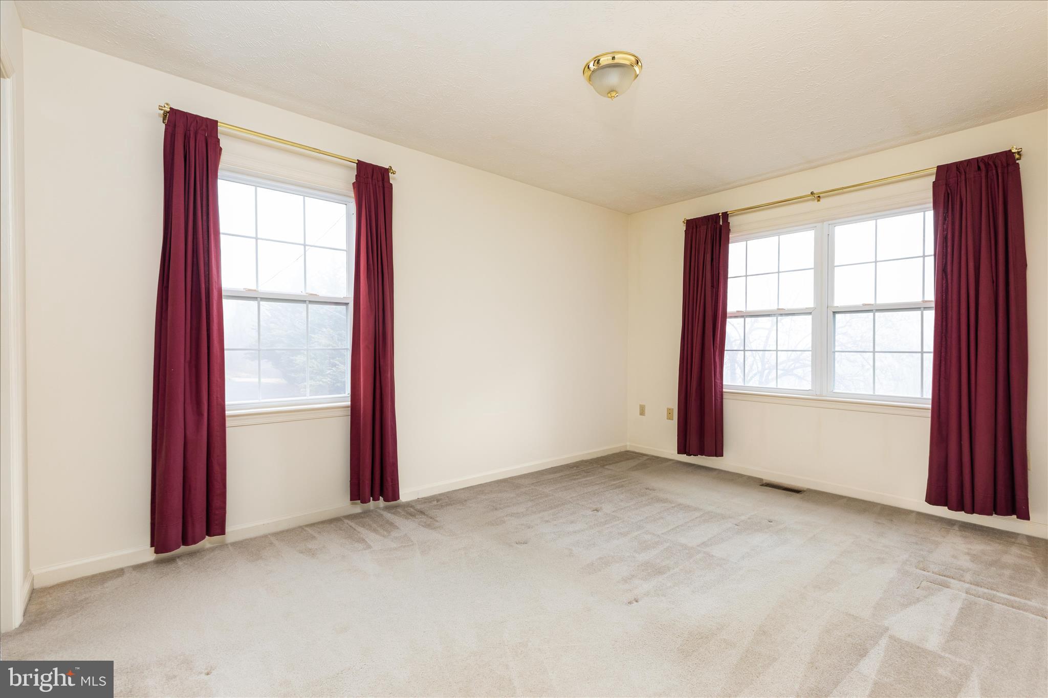 1057 Harmony Orchard Road Front Royal, VA 22630 - Photo 12 of 48 an empty room with windows