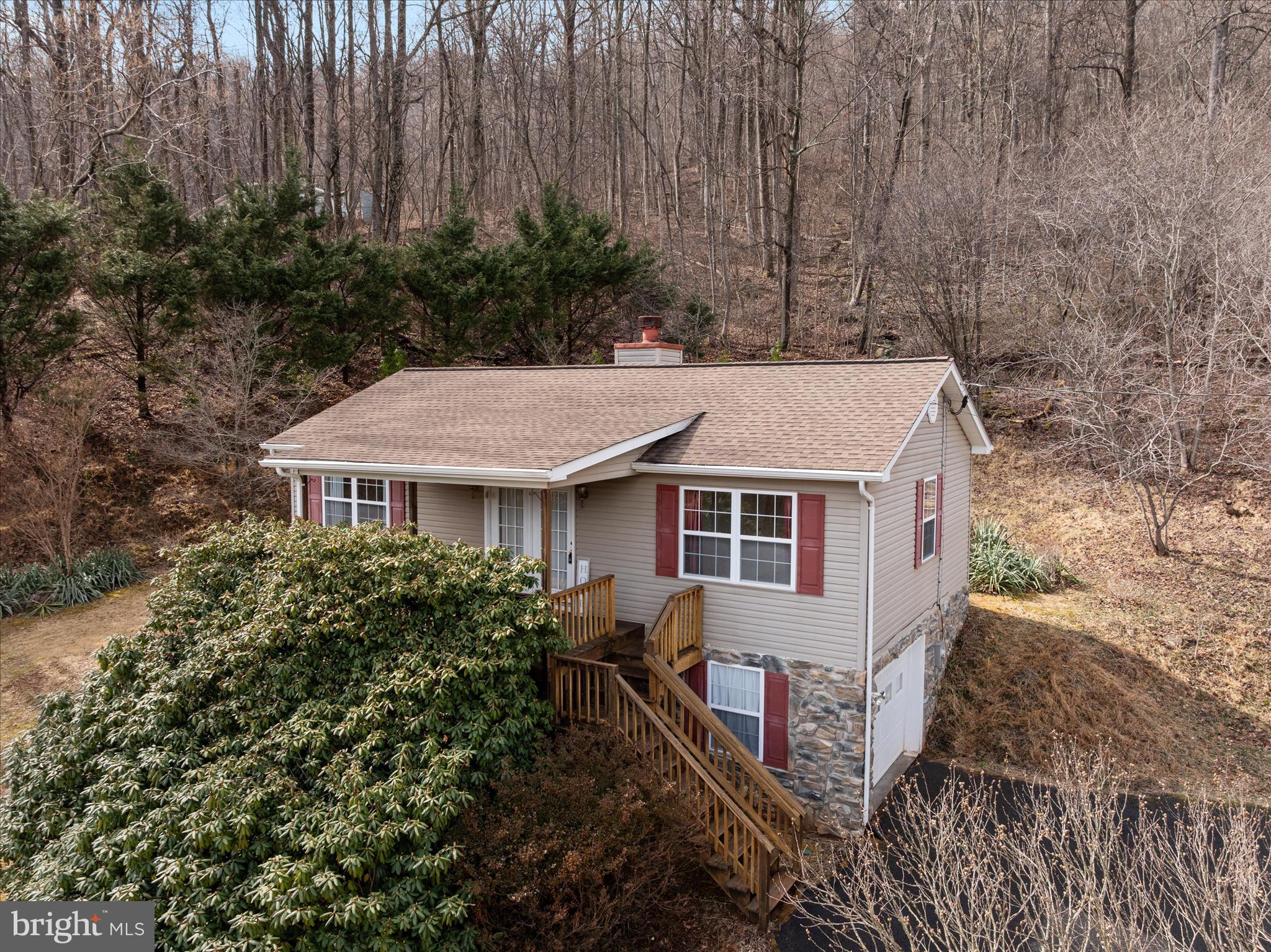 1057 Harmony Orchard Road Front Royal, VA 22630 - Photo 2 of 48 front view of a house with a yard