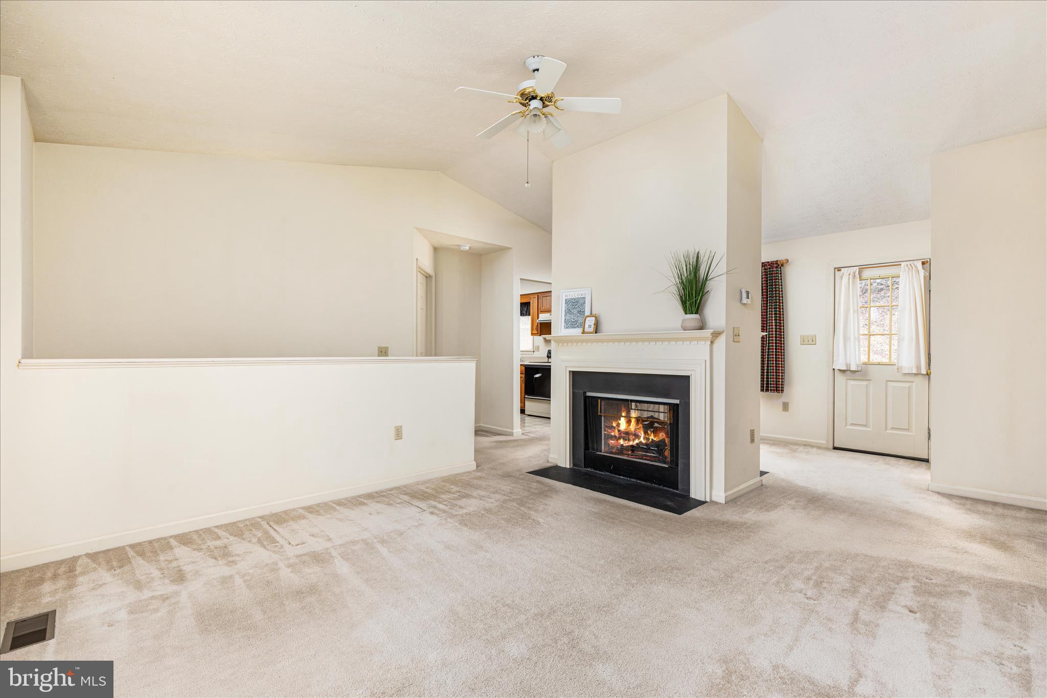 1057 Harmony Orchard Road Front Royal, VA 22630 - Photo 4 of 48 a view of a room with fireplace and windows