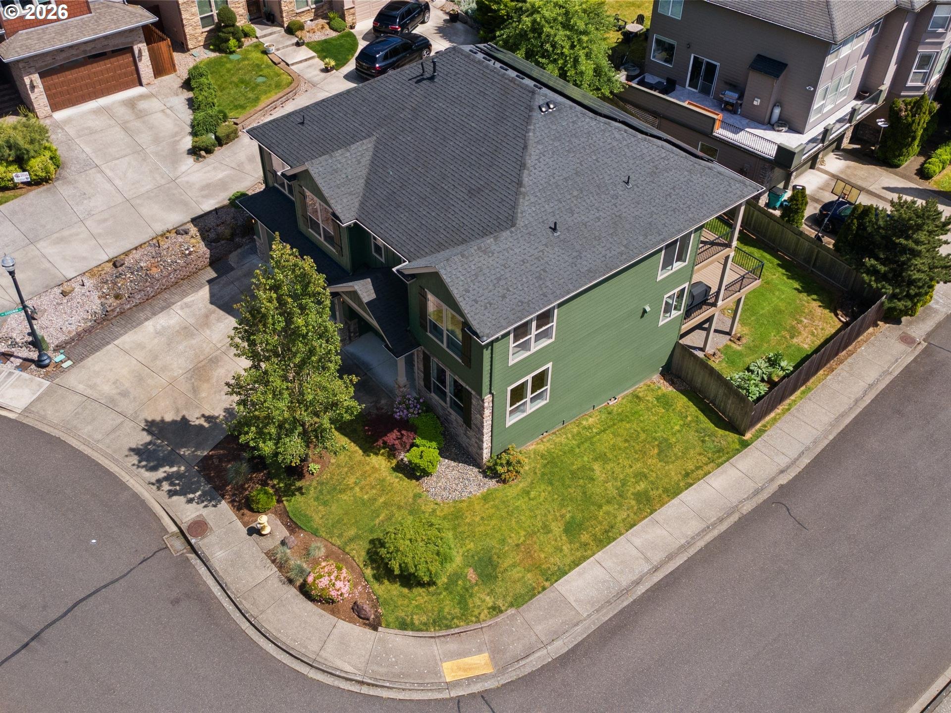 1012 Northwest Goodwin Street Camas, WA 98607 - Photo 39 of 44 an aerial view of a house with a garden and yard