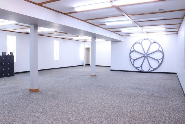 a view of a room with wooden walls