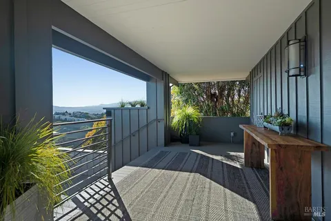 a view of a patio with furniture