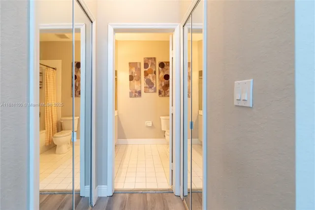 a view of a bathroom with a glass door