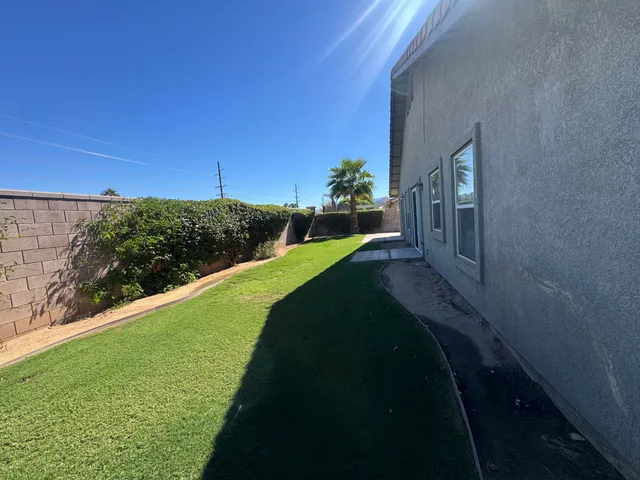 a view of a balcony with an outdoor space
