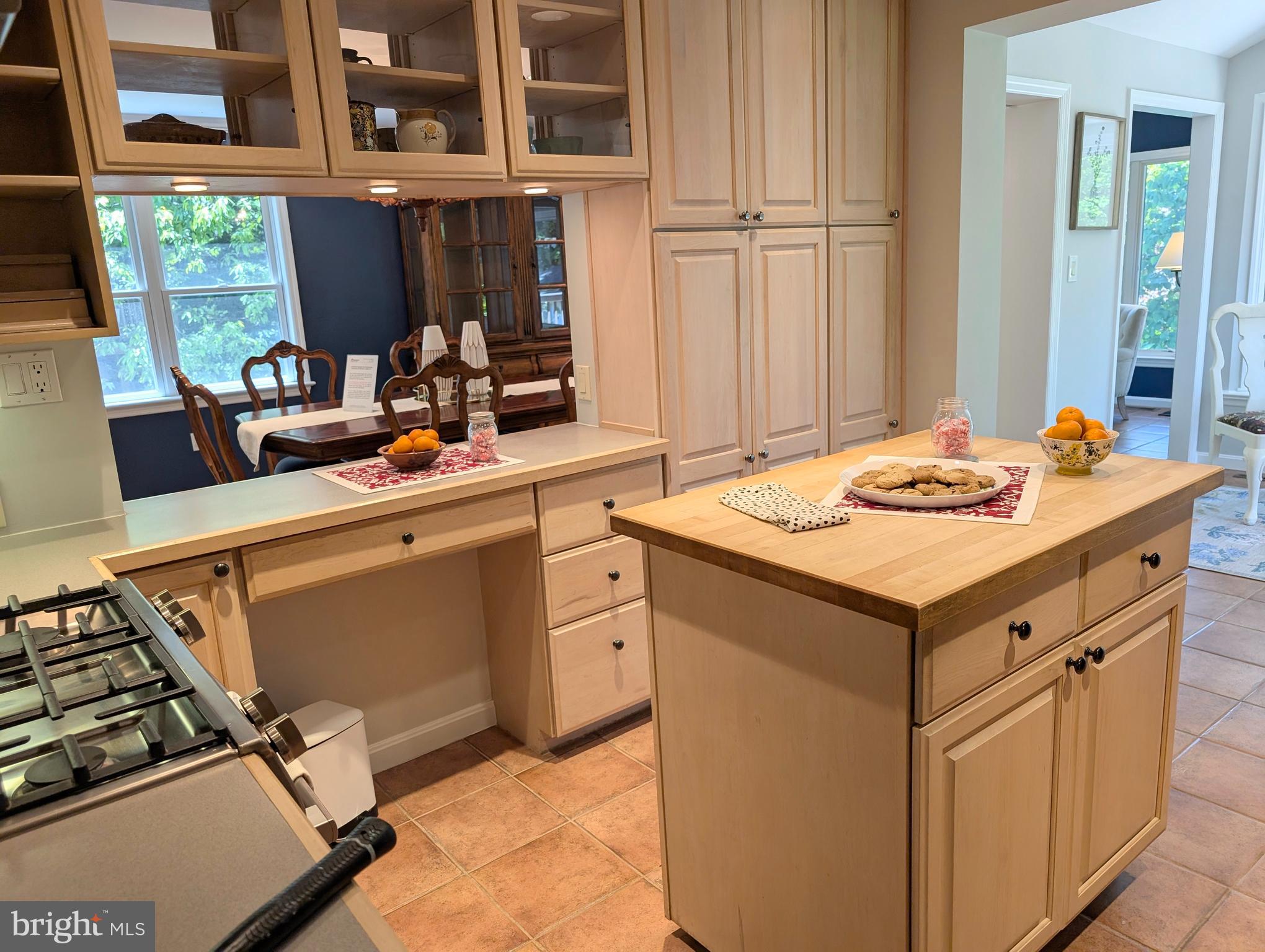 9510 Clement Road Silver Spring, MD 20910 - Photo 14 of 80 a kitchen with a stove and a sink