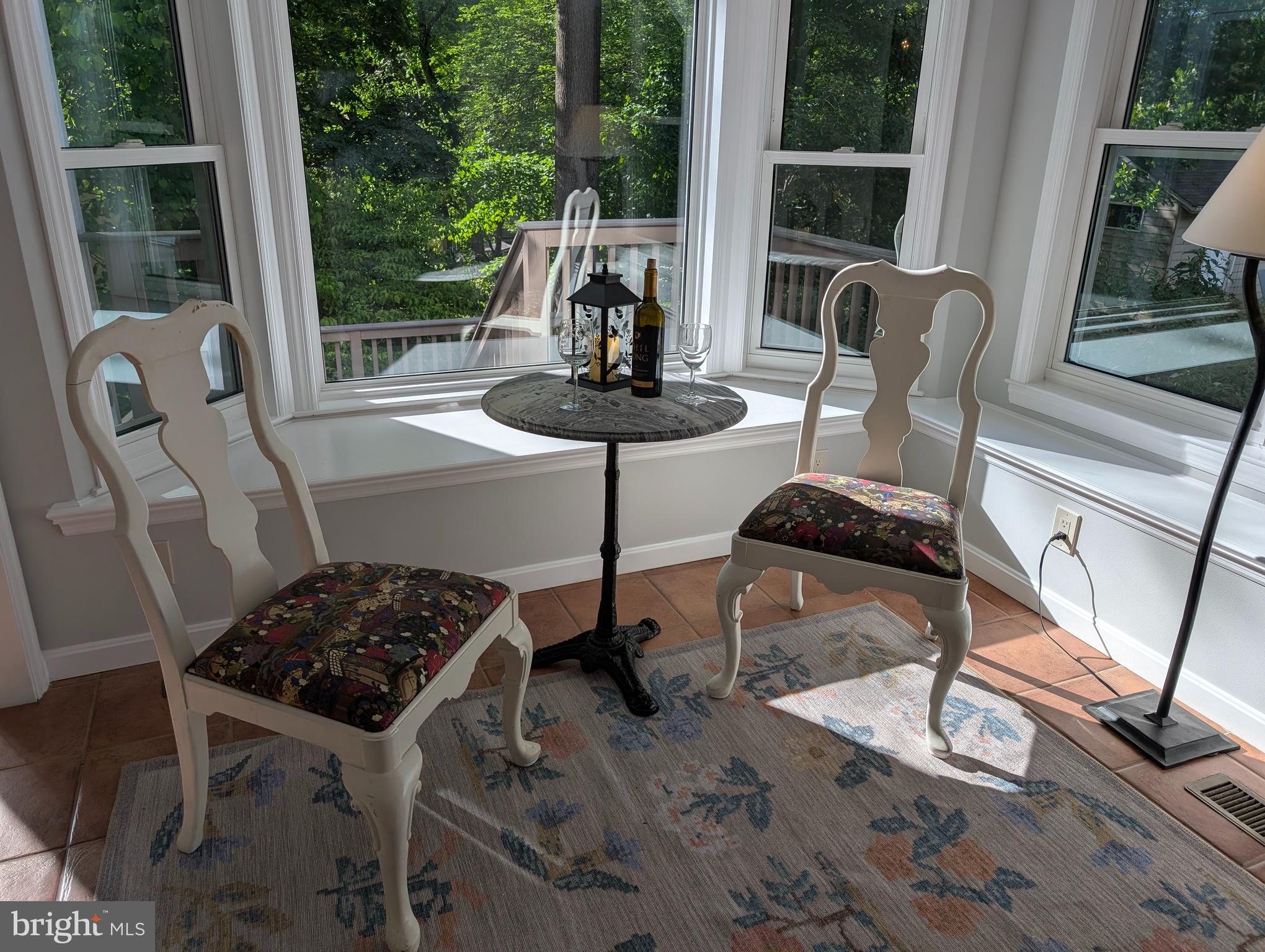 9510 Clement Road Silver Spring, MD 20910 - Photo 17 of 80 a table and chairs in a room
