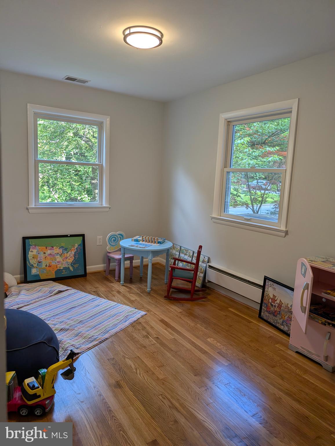 9510 Clement Road Silver Spring, MD 20910 - Photo 26 of 80 a living room with furniture and a fireplace
