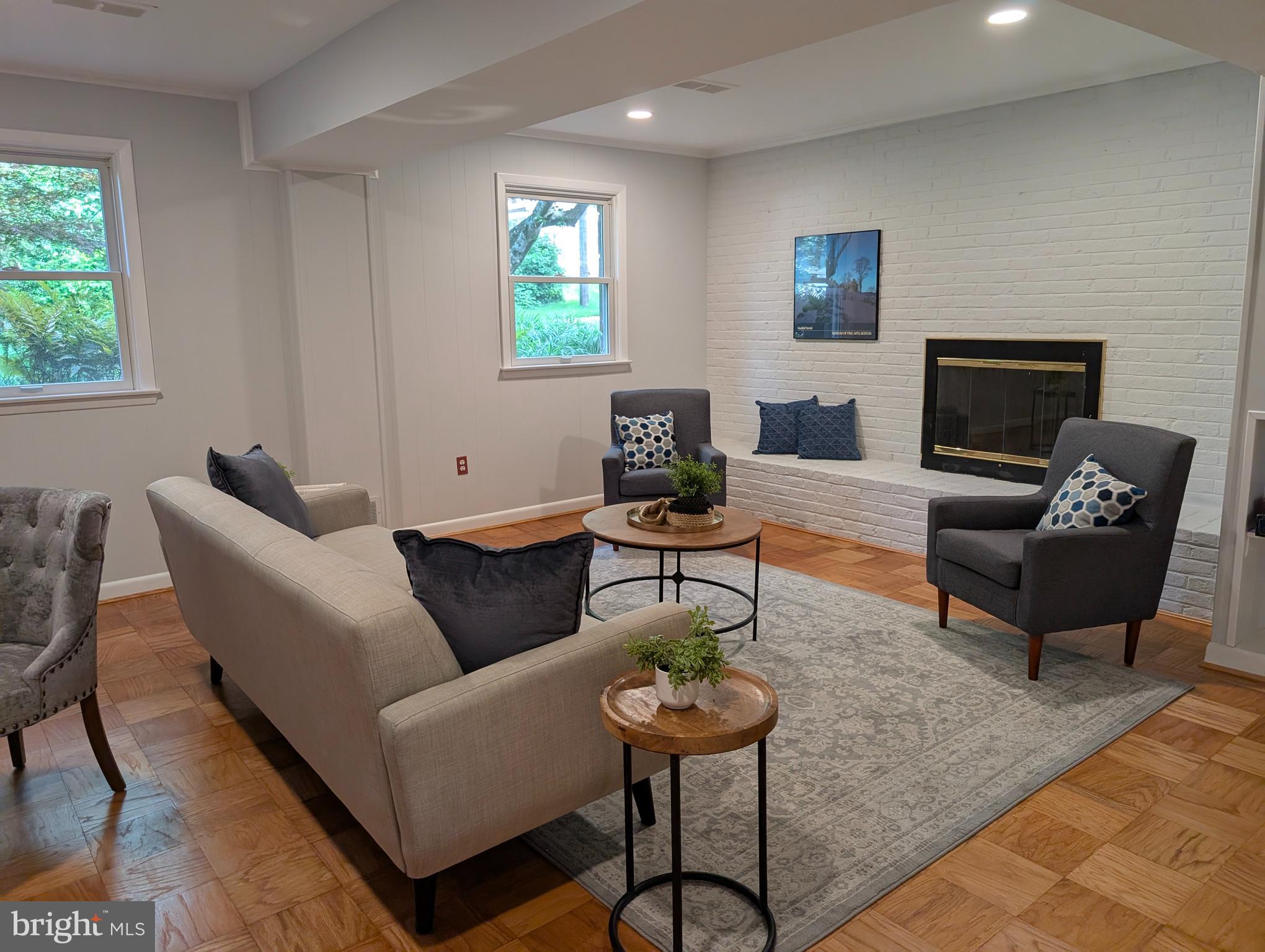 9510 Clement Road Silver Spring, MD 20910 - Photo 31 of 80 a living room with furniture and a fireplace