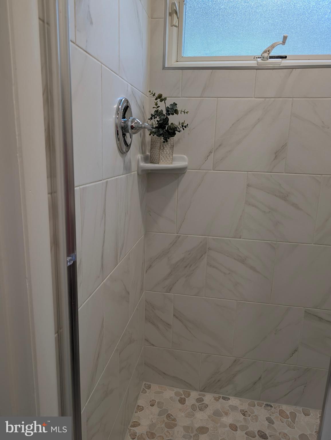 9510 Clement Road Silver Spring, MD 20910 - Photo 33 of 80 a close view of a shower in bathroom