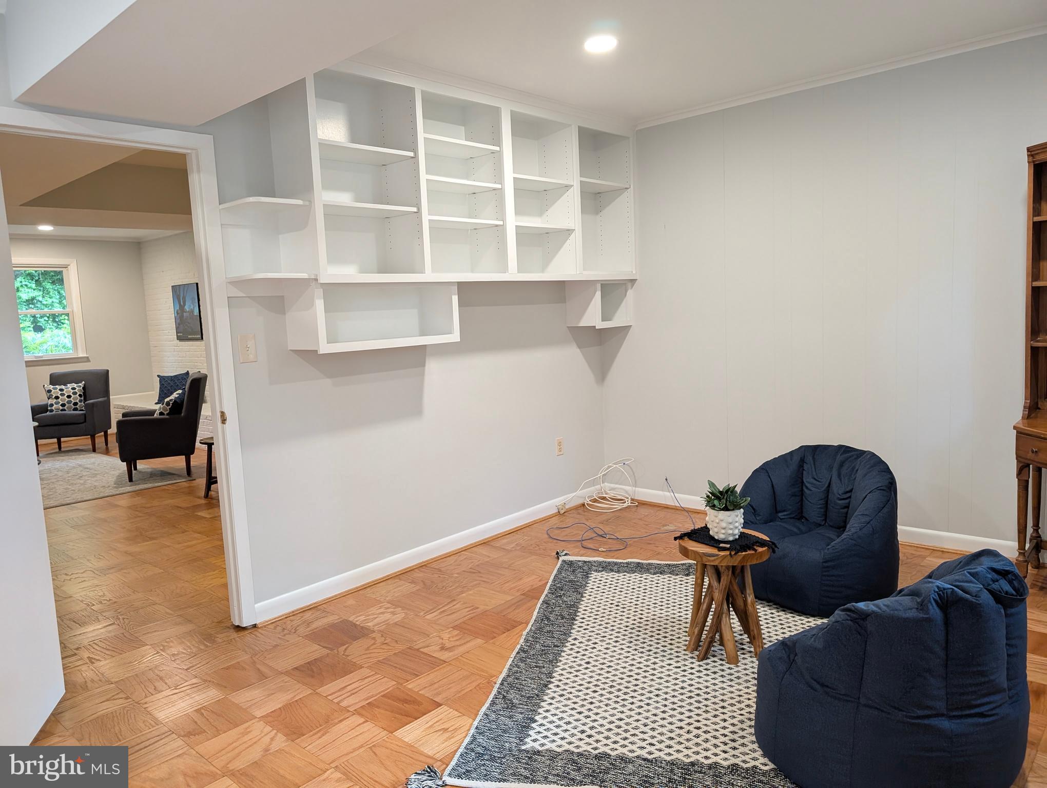 9510 Clement Road Silver Spring, MD 20910 - Photo 35 of 80 a workspace with furniture and a window