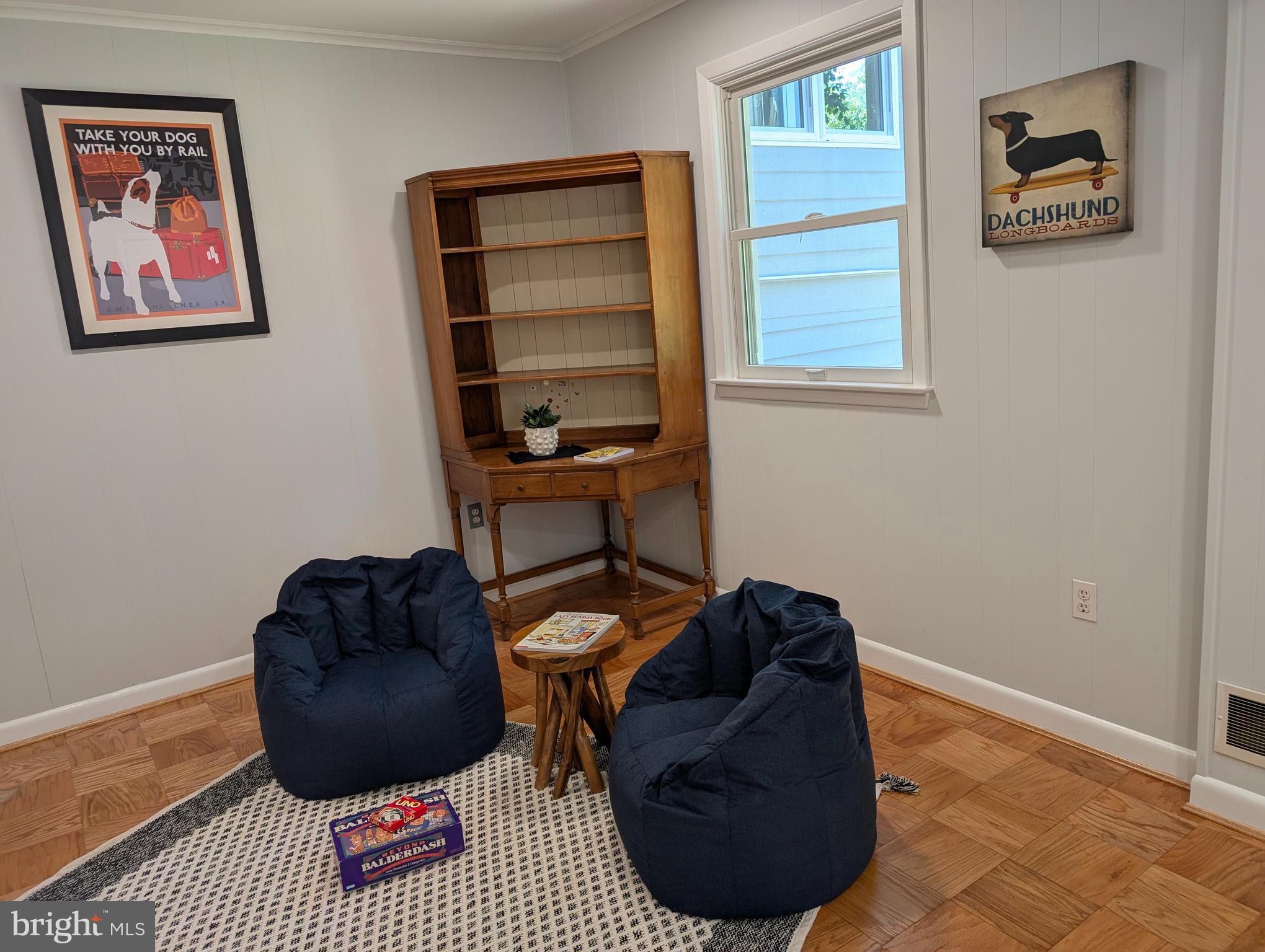 9510 Clement Road Silver Spring, MD 20910 - Photo 36 of 80 a living room with furniture and a rug