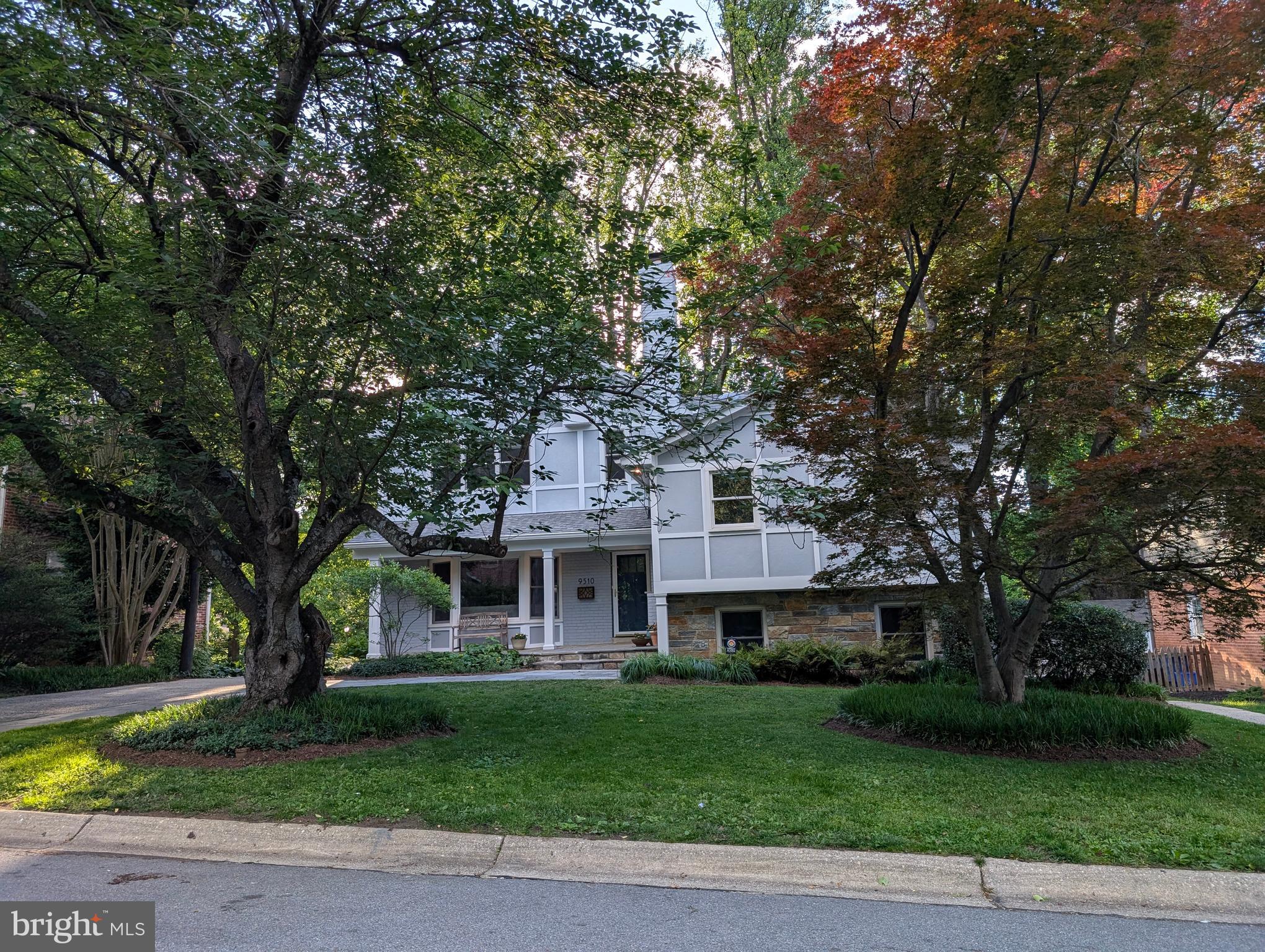 9510 Clement Road Silver Spring, MD 20910 - Photo 4 of 80 a front view of a house with a garden