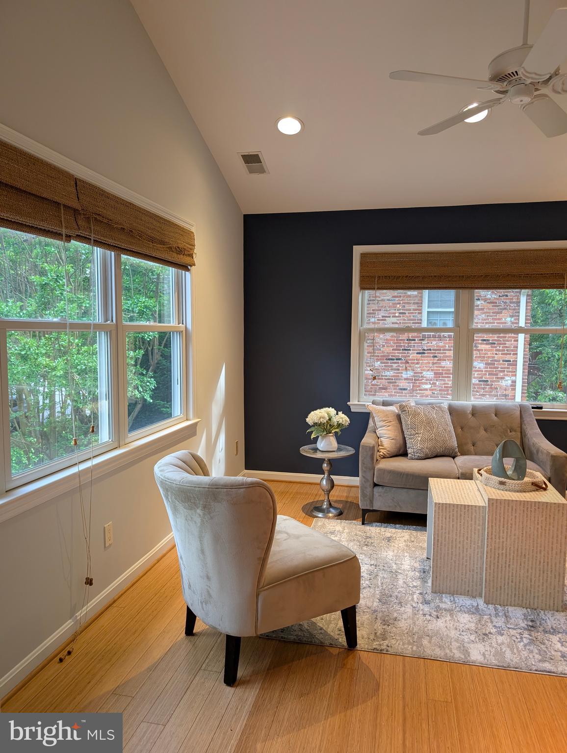 9510 Clement Road Silver Spring, MD 20910 - Photo 52 of 80 a living room with furniture and large windows