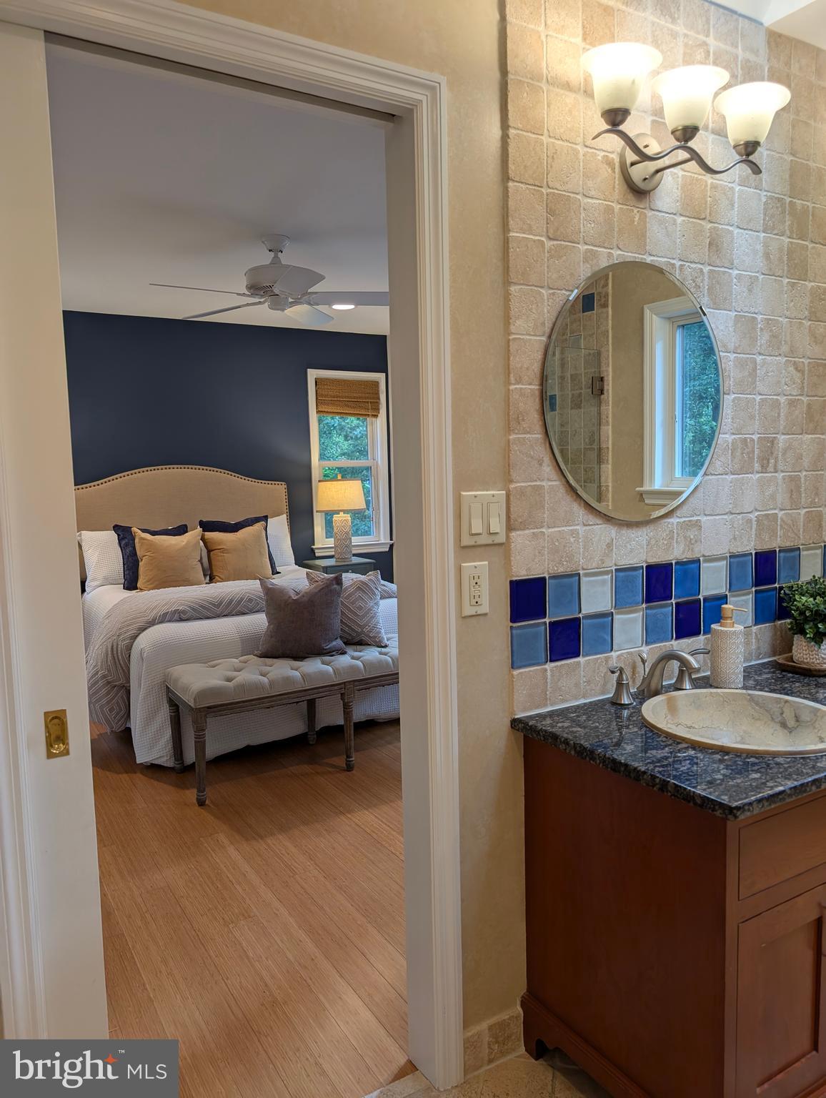 9510 Clement Road Silver Spring, MD 20910 - Photo 56 of 80 a living room with granite countertop furniture and a mirror