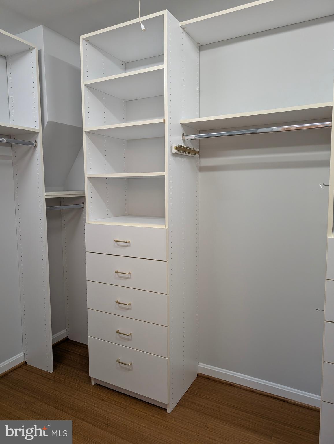 9510 Clement Road Silver Spring, MD 20910 - Photo 59 of 80 a view of walk in closet with empty racks
