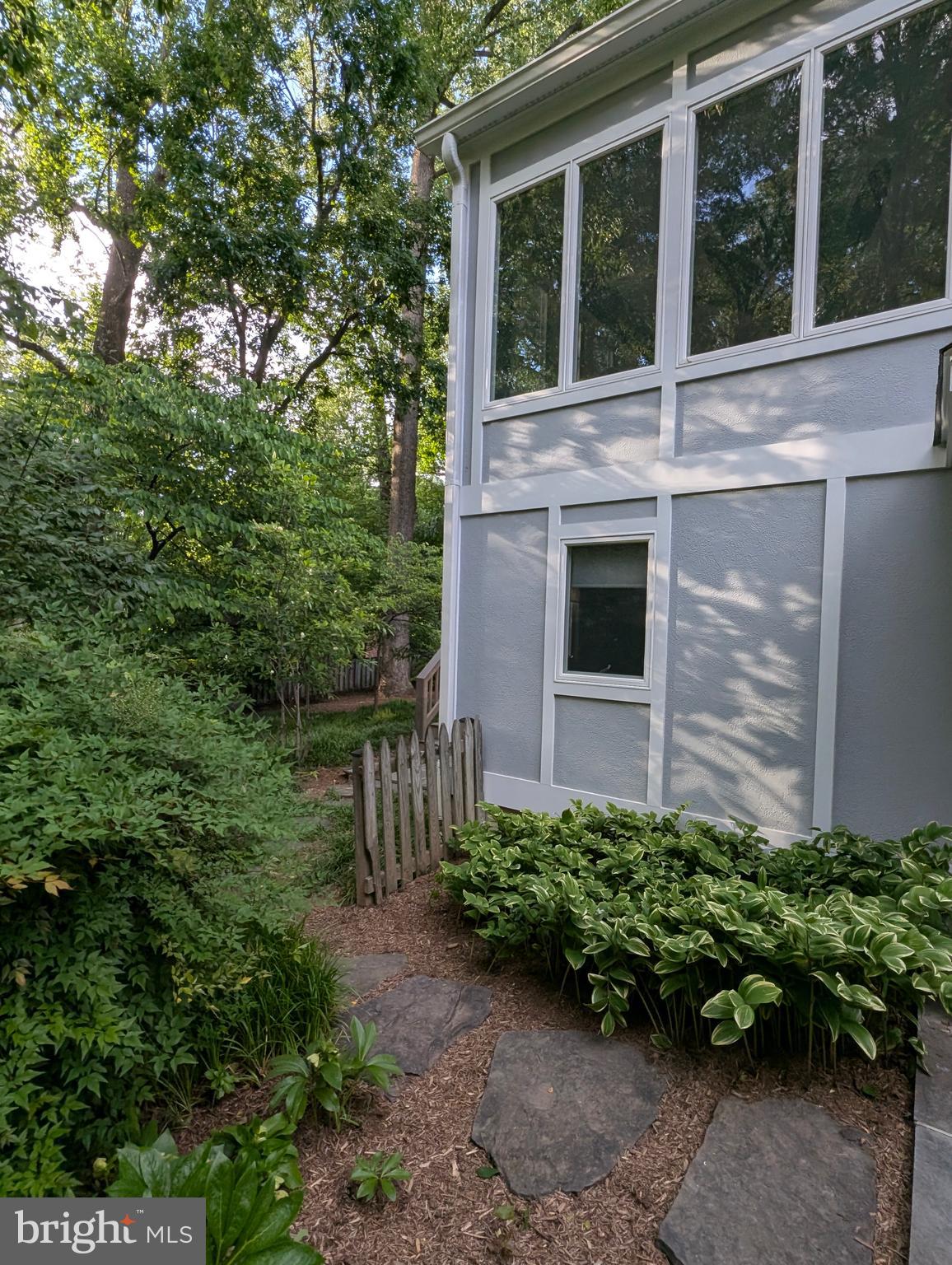 9510 Clement Road Silver Spring, MD 20910 - Photo 72 of 80 a view of a garden with a house