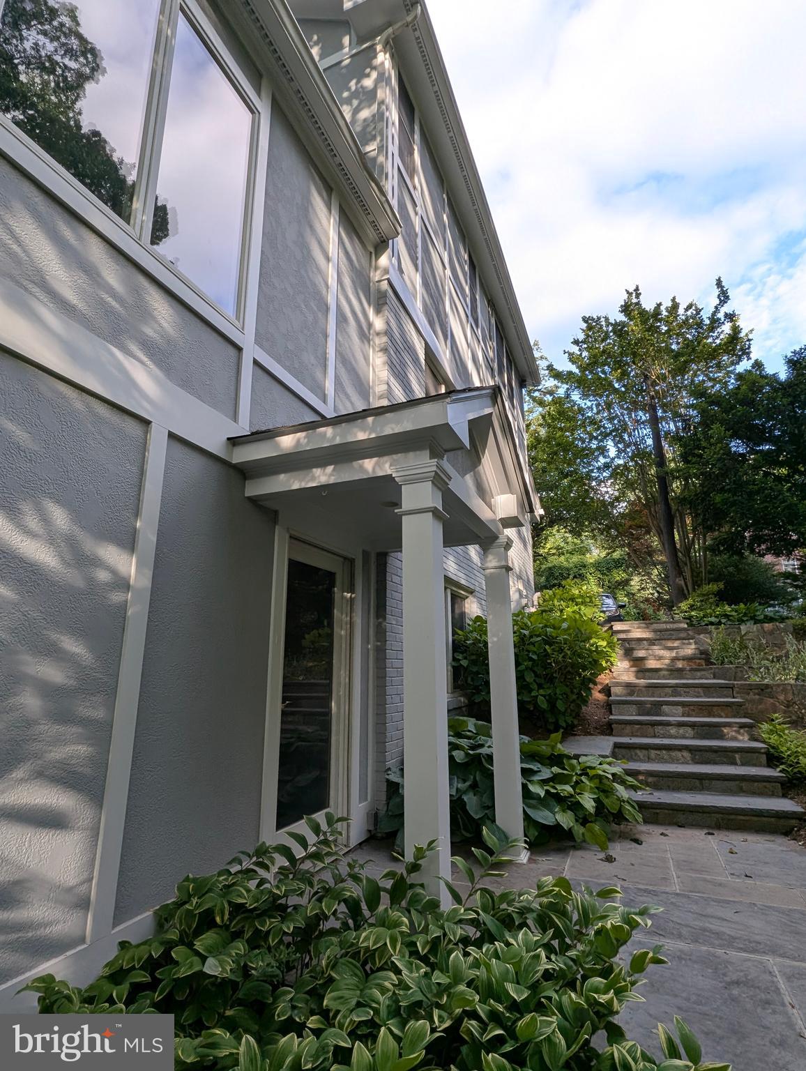 9510 Clement Road Silver Spring, MD 20910 - Photo 74 of 80 a view of a pathway of a house with flower plants