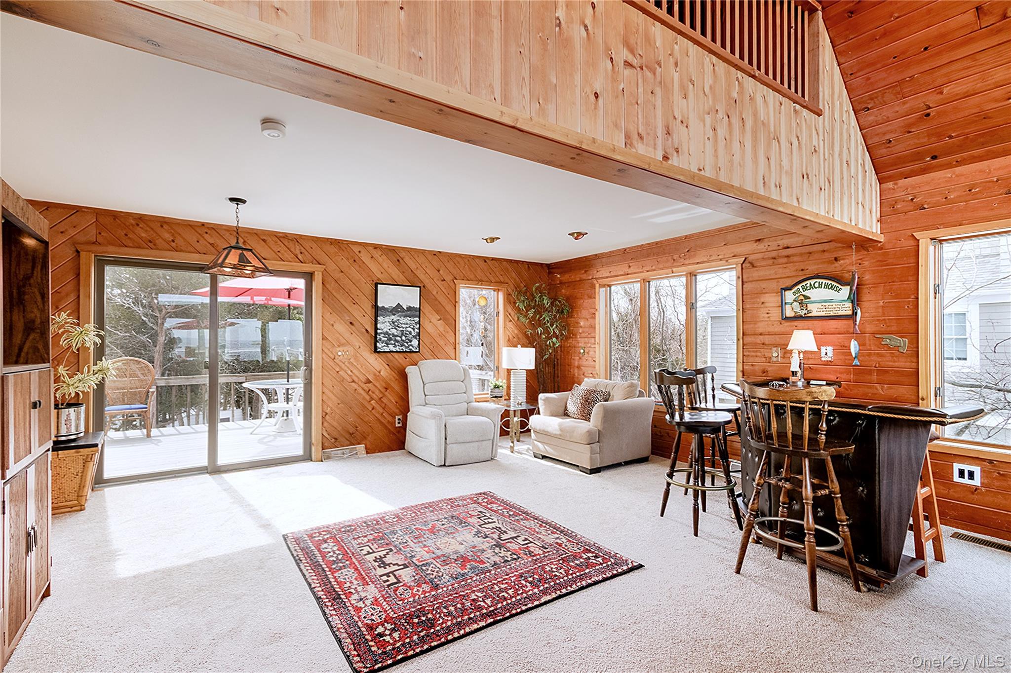 171 Harbor Beach Road Mount Sinai, NY 11766 - Photo 14 of 46 bar and lounge with access to back deck