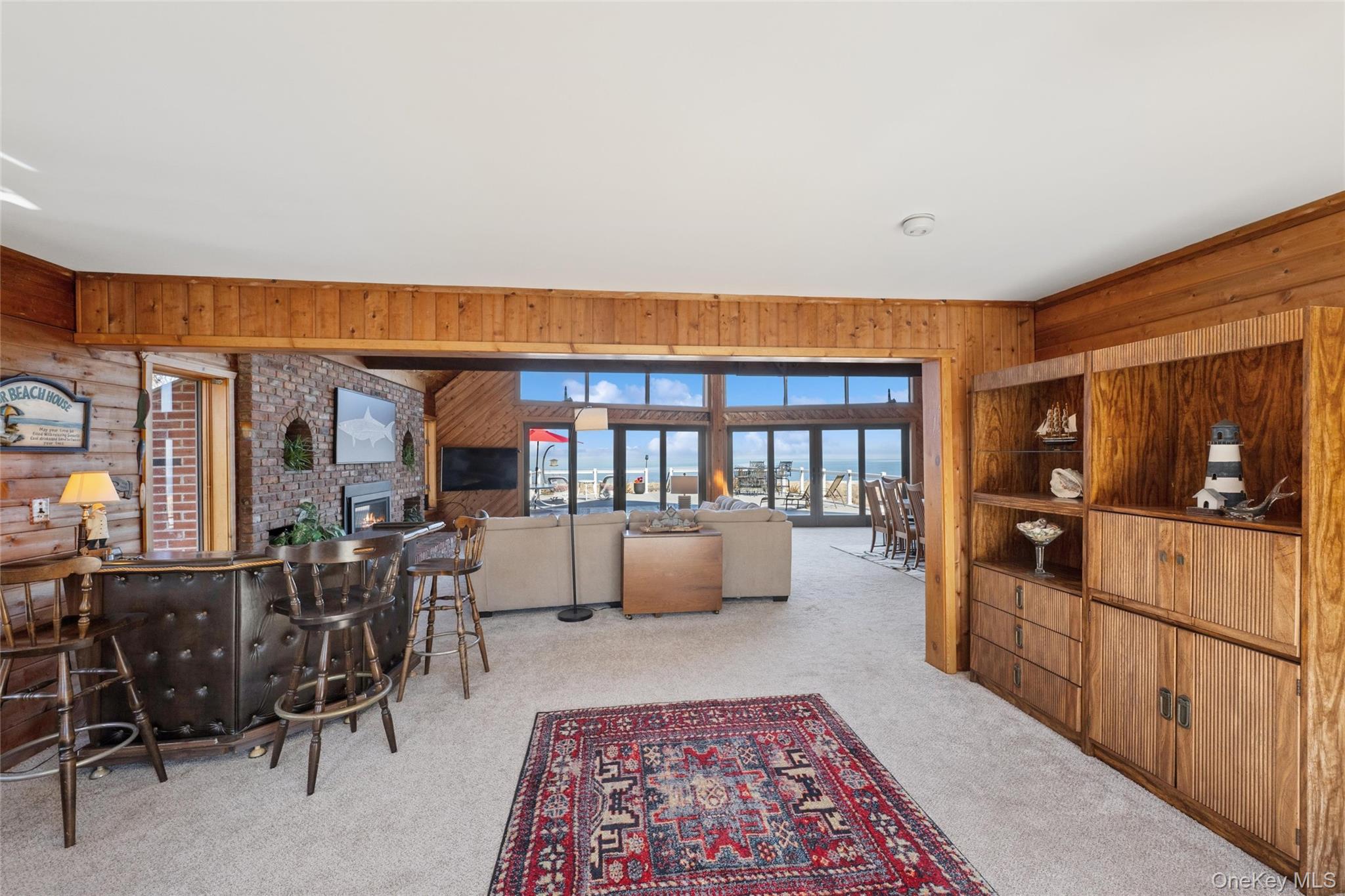 171 Harbor Beach Road Mount Sinai, NY 11766 - Photo 15 of 46 bar, lounge area open to living area