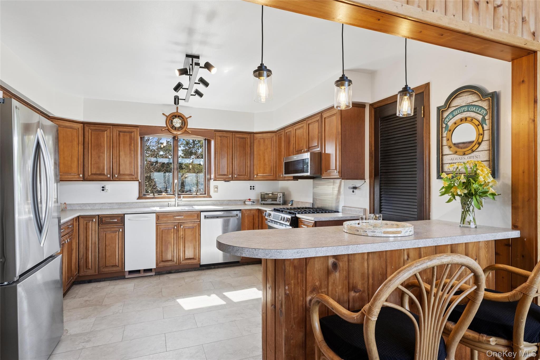 171 Harbor Beach Road Mount Sinai, NY 11766 - Photo 21 of 46 pendant lights over breakfast bar, stainless steel appliances