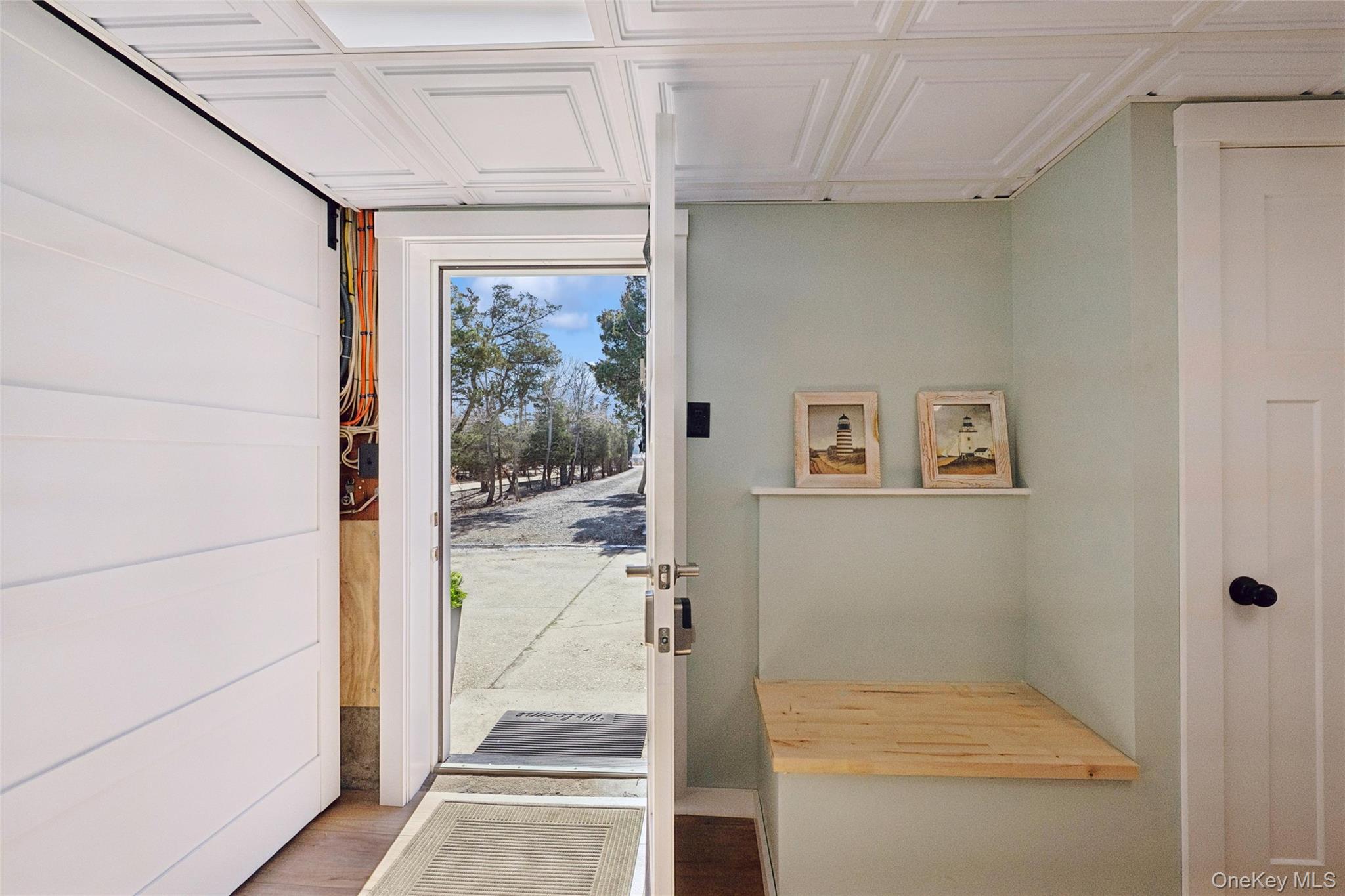 171 Harbor Beach Road Mount Sinai, NY 11766 - Photo 33 of 46 ground floor entry to driveway