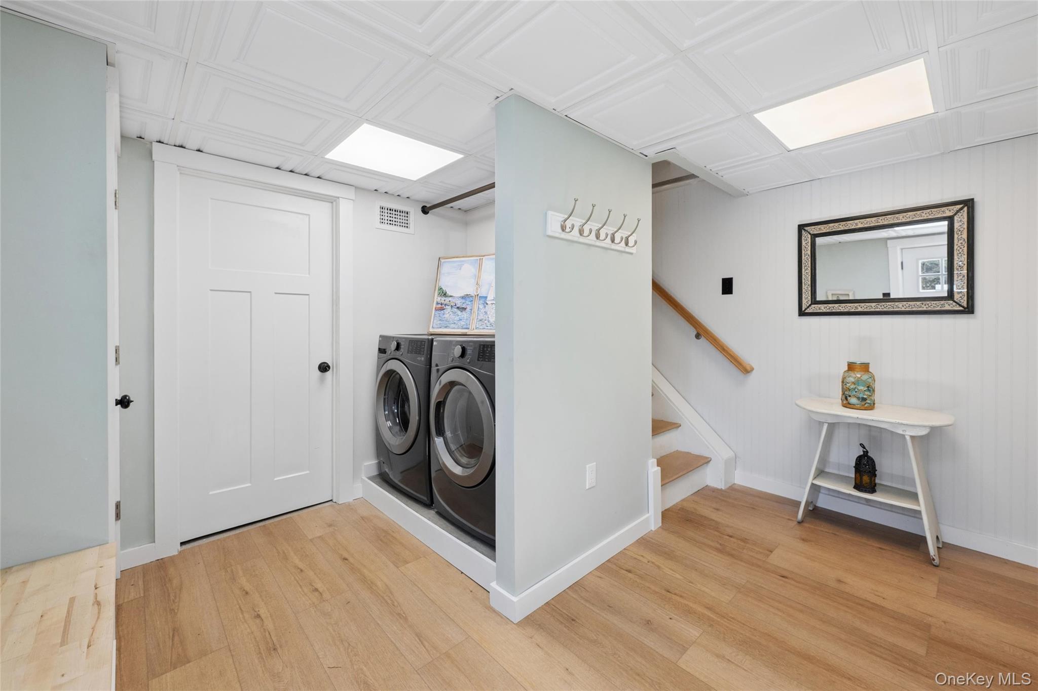 171 Harbor Beach Road Mount Sinai, NY 11766 - Photo 33 of 43 a view of a hallway with washer and dryer