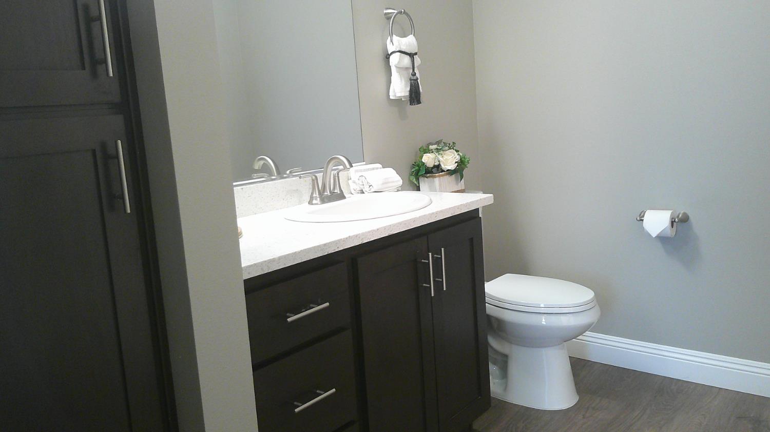 140 Ivy Avenue, Unit 39 Patterson, CA 95363 - Photo 26 of 47 a bathroom with a sink and a toilet