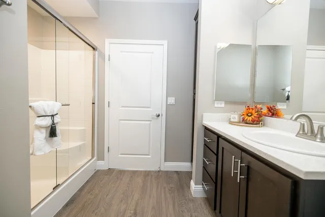 a bathroom with a sink and a mirror