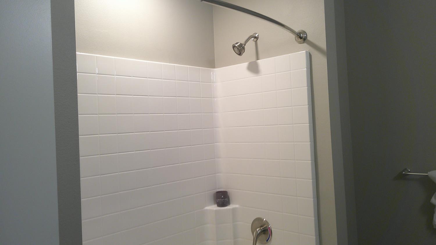 140 Ivy Avenue, Unit 39 Patterson, CA 95363 - Photo 35 of 47 a bathroom with a shower