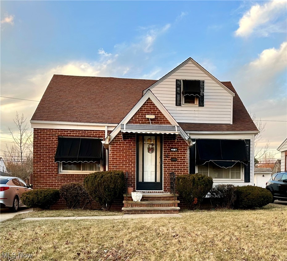 4197 Lambert Road Cleveland, OH 44121 - Photo 1 of 13 View of front of home featuring a front yard