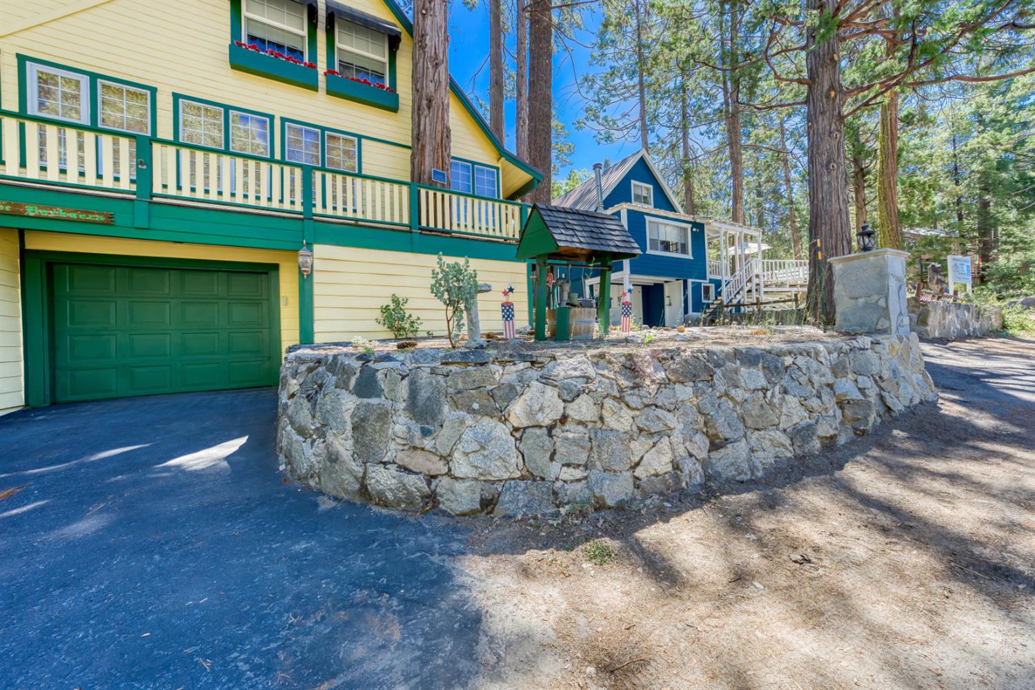 42025 Tollhouse Road Shaver Lake, CA 93664 - Photo 10 of 64 a view of a house with a yard