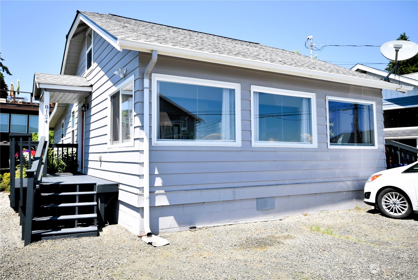 8124 East Daniels Loop Port Orchard, WA 98366 - Photo 2 of 24 a view of a house with a outdoor space