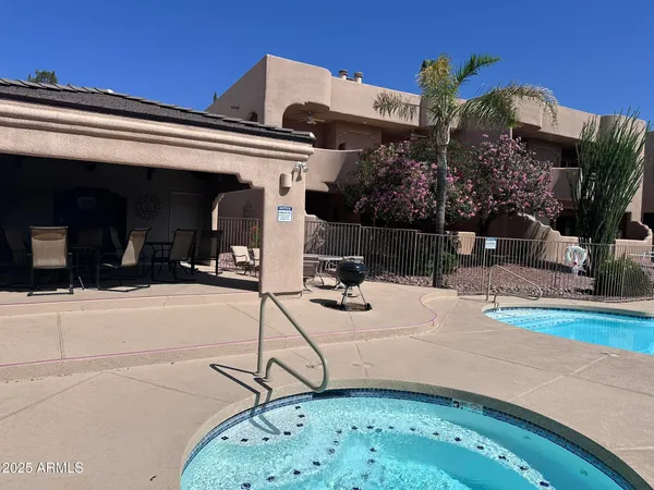 a view of a terrace with a garden