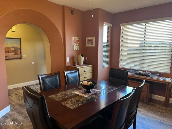 a living room with furniture and window