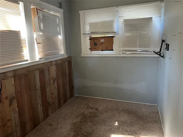 a bathroom with a sink a mirror and window