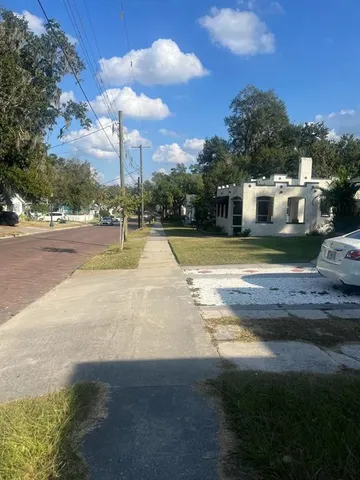 a view of a house with a big yard