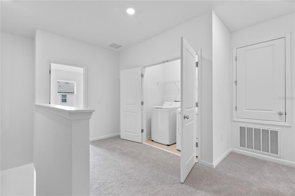 624 Poppy Lane Dundee, FL 33838 - Photo 12 of 23 a view of a livingroom with an empty space