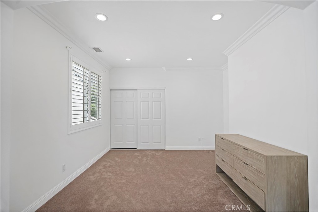 11855 Modena Drive Rancho Cucamonga, CA 91701 - Photo 17 of 30 an empty room with windows