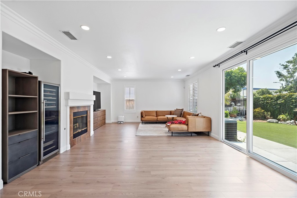 11855 Modena Drive Rancho Cucamonga, CA 91701 - Photo 5 of 30 a living room with furniture and a flat screen tv