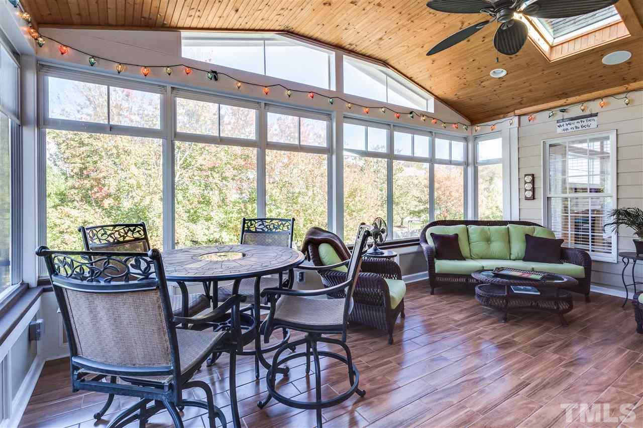 9004 Shellwood Court Raleigh, NC 27617 - Photo 11 of 25 a living room with furniture and wooden floor
