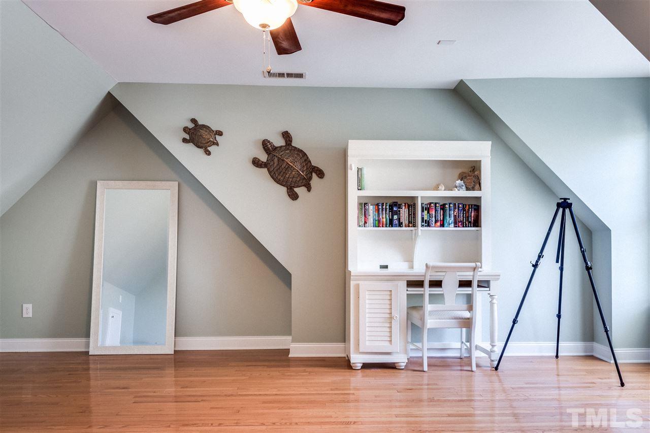 9004 Shellwood Court Raleigh, NC 27617 - Photo 16 of 25 a view of entryway and hall with wooden floor