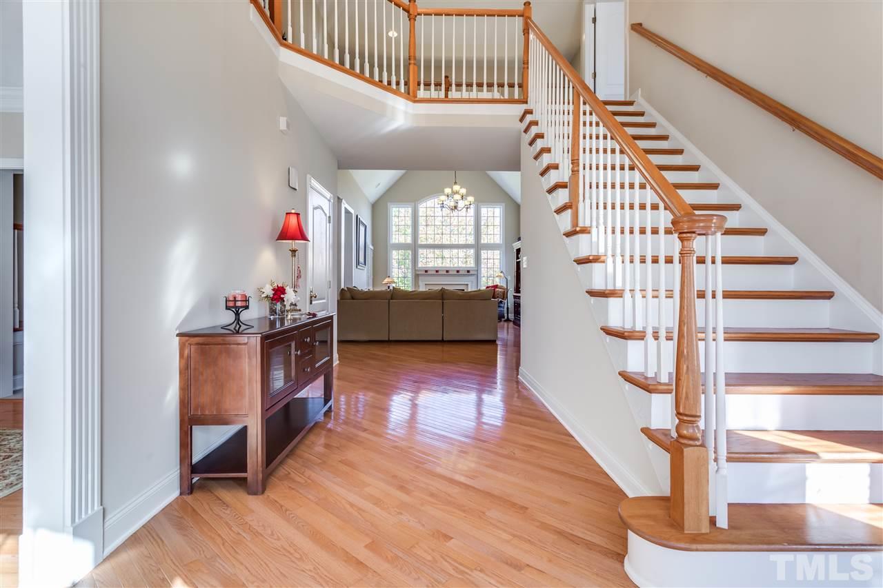 9004 Shellwood Court Raleigh, NC 27617 - Photo 3 of 25 a view of entryway and hall with wooden floor