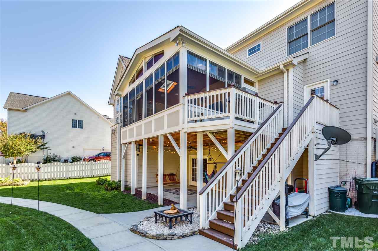 9004 Shellwood Court Raleigh, NC 27617 - Photo 24 of 25 a front view of house with yard and green space