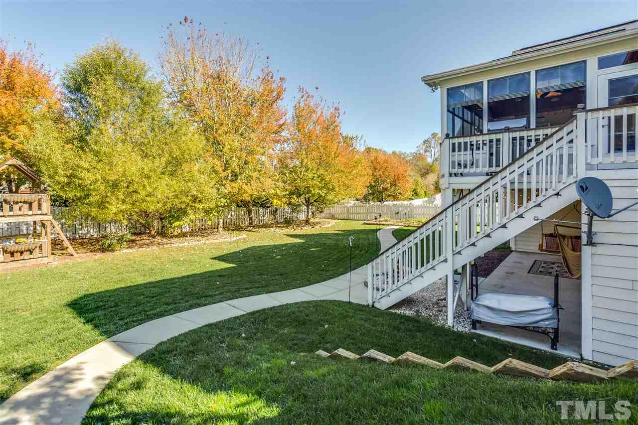9004 Shellwood Court Raleigh, NC 27617 - Photo 25 of 25 a view of a house with a yard