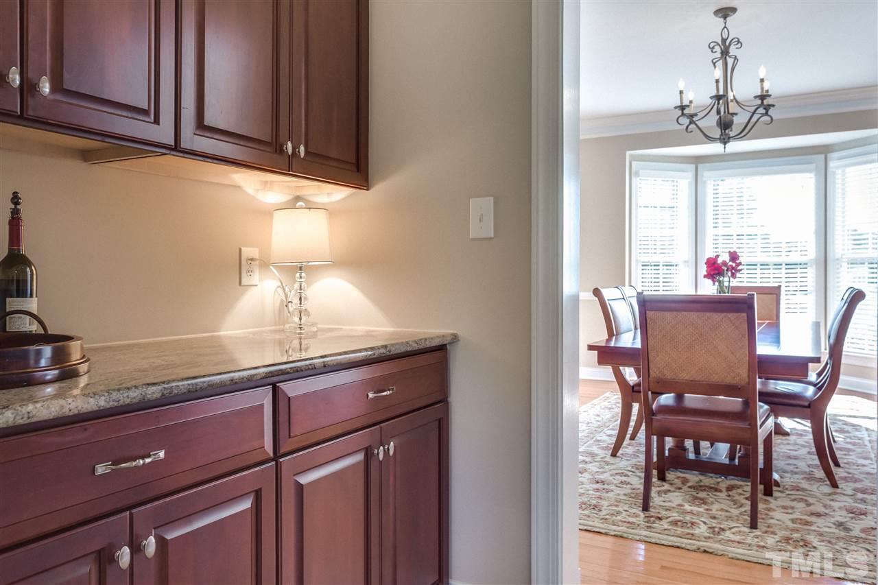 9004 Shellwood Court Raleigh, NC 27617 - Photo 5 of 25 a view of a dining room with furniture and window